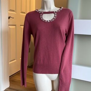 Beautiful cozy and warm sweater with rhinestones.